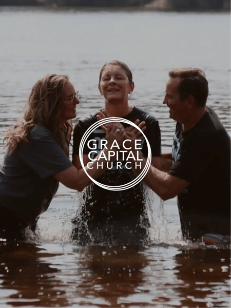Grace Capital Church's logo over a photo of three people in a river