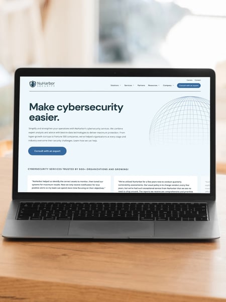 NuHarbor Security Website on a laptop