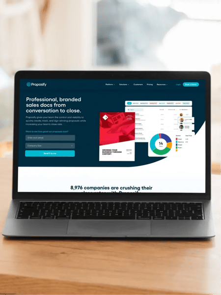 Proposify's website homepage displayed on a laptop